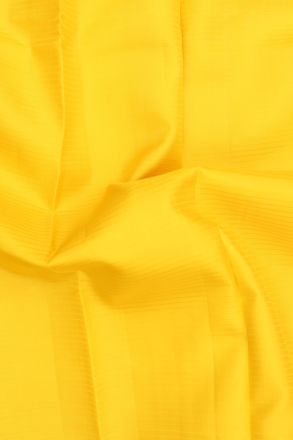 Kanchipuram Silk Saree In Yellow With Self Stripes Design