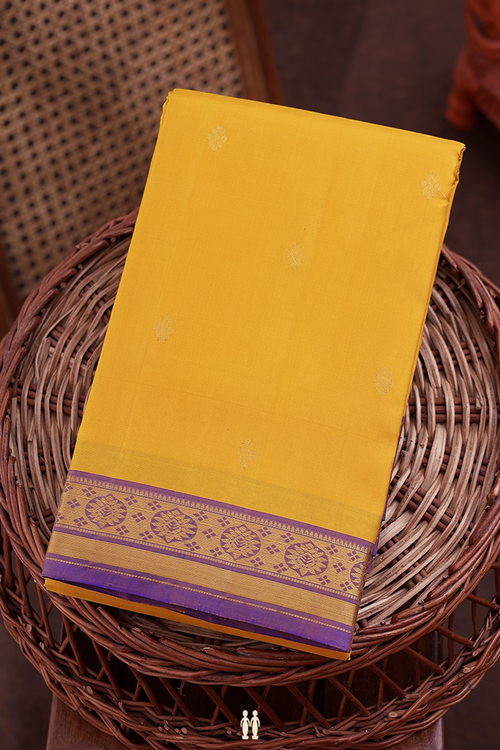 Kanchipuram Silk Saree In Saffron Yellow With Floral Buttas