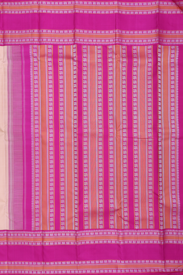 Kanchipuram Silk Saree In Creamy Orange With Peacock Buttas