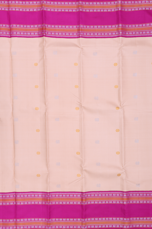 Kanchipuram Silk Saree In Creamy Orange With Peacock Buttas