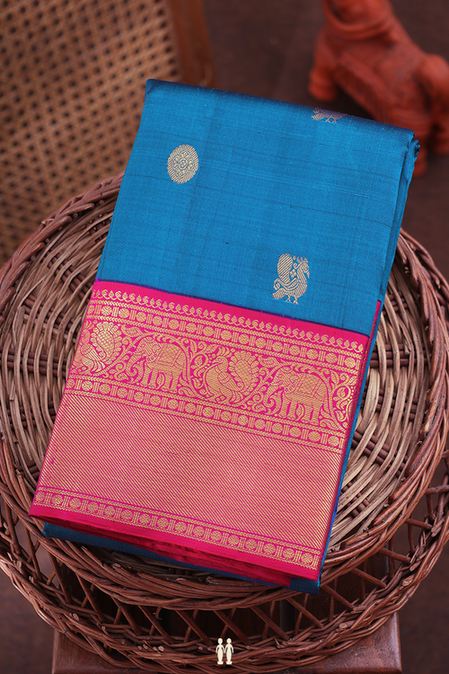 Kanchipuram Silk Saree In Capri Blue With Peacock Buttas