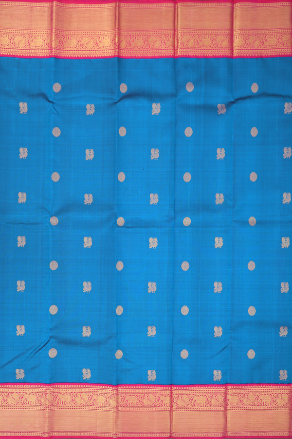 Kanchipuram Silk Saree In Capri Blue With Peacock Buttas
