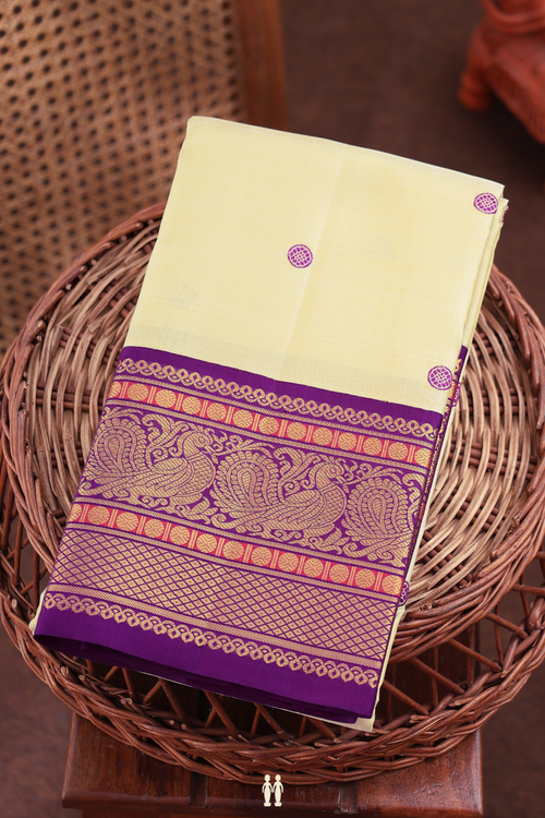 Kanchipuram Silk Saree In Cream Color With Chakram Buttas