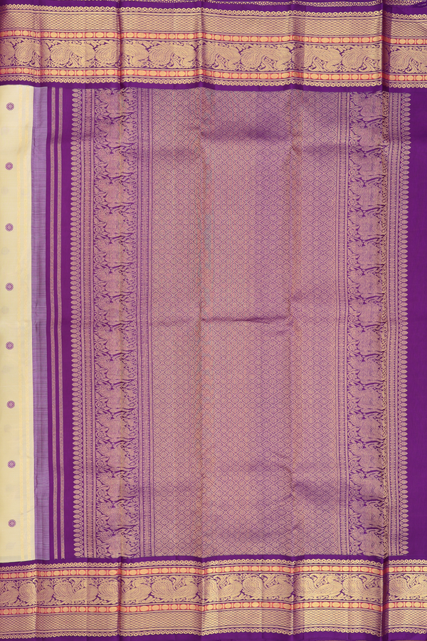 Kanchipuram Silk Saree In Cream Color With Chakram Buttas