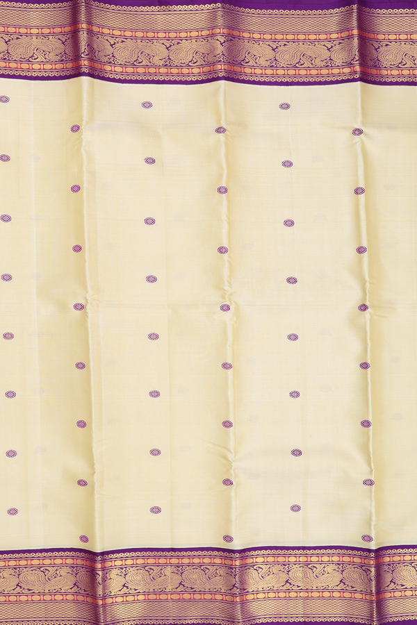 Kanchipuram Silk Saree In Cream Color With Chakram Buttas