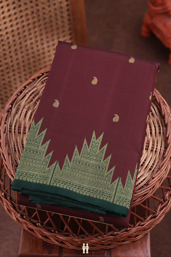 Kanchipuram Silk Saree In Burgundy Red With Paisley Buttis