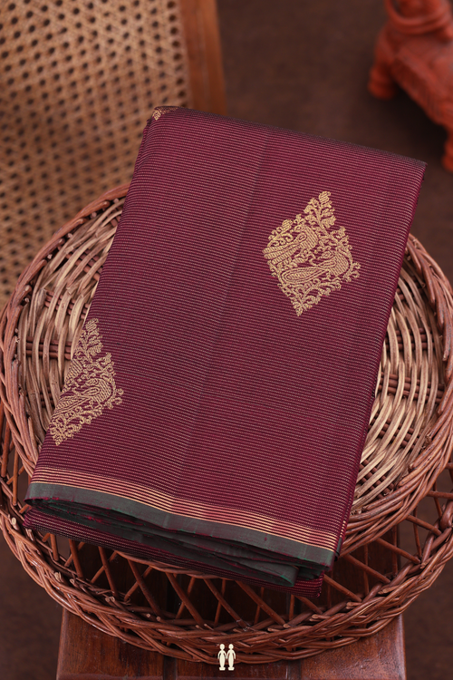 Kanchipuram Silk Saree In Maroon Along Stripes With Buttas