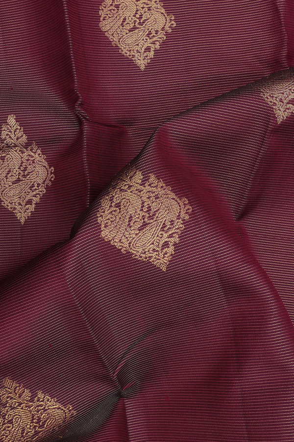 Kanchipuram Silk Saree In Maroon Along Stripes With Buttas