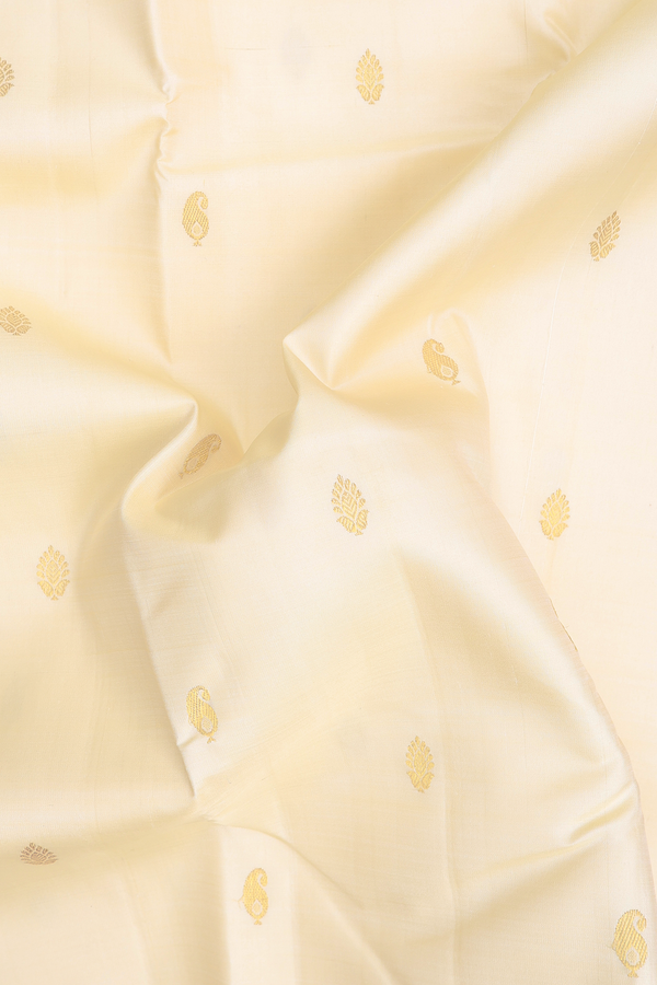 Kanchipuram Silk Saree In Off White With Paisley Buttas
