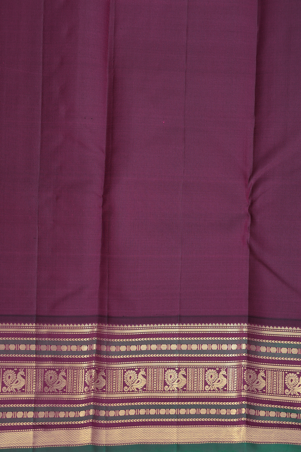 Kanchipuram Silk Saree In Green With Peacock Chakram Buttas