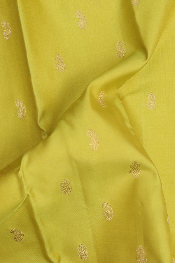 Kanchipuram Silk Saree In Olive Yellow With Paisley Buttas