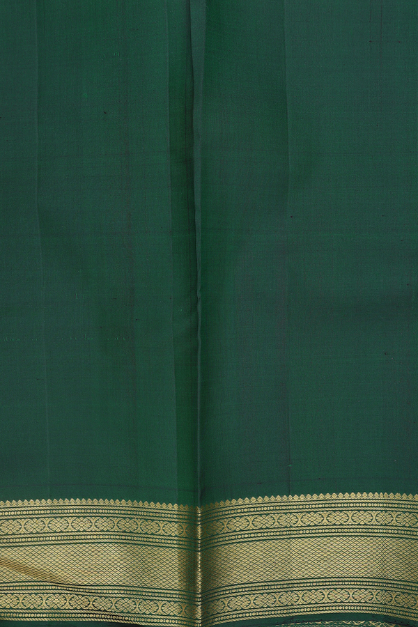 Kanchipuram Silk Saree In Forest Green With Peacock Buttas