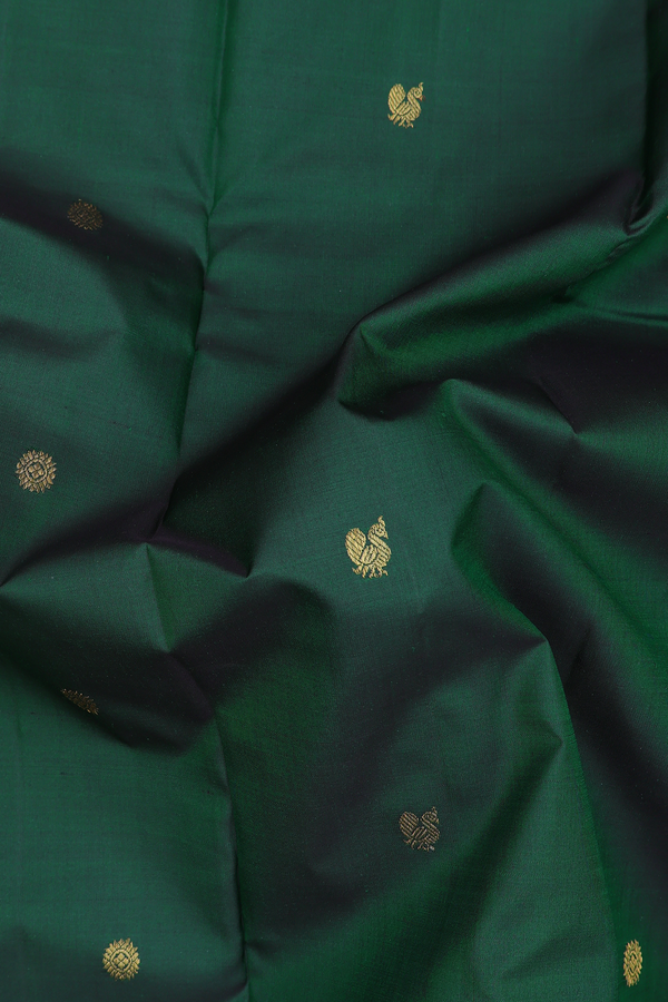 Kanchipuram Silk Saree In Forest Green With Peacock Buttas