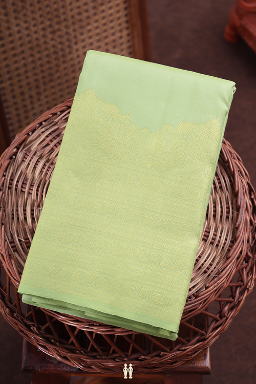 Kanchipuram Silk Saree In Pastel Green With Peacock Buttas