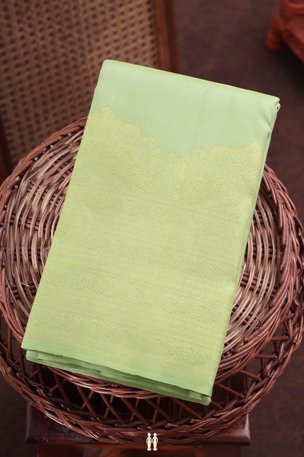 Kanchipuram Silk Saree In Pastel Green With Peacock Buttas