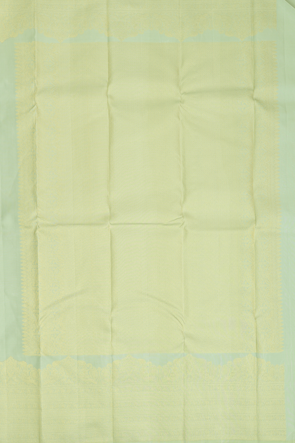 Kanchipuram Silk Saree In Pastel Green With Peacock Buttas