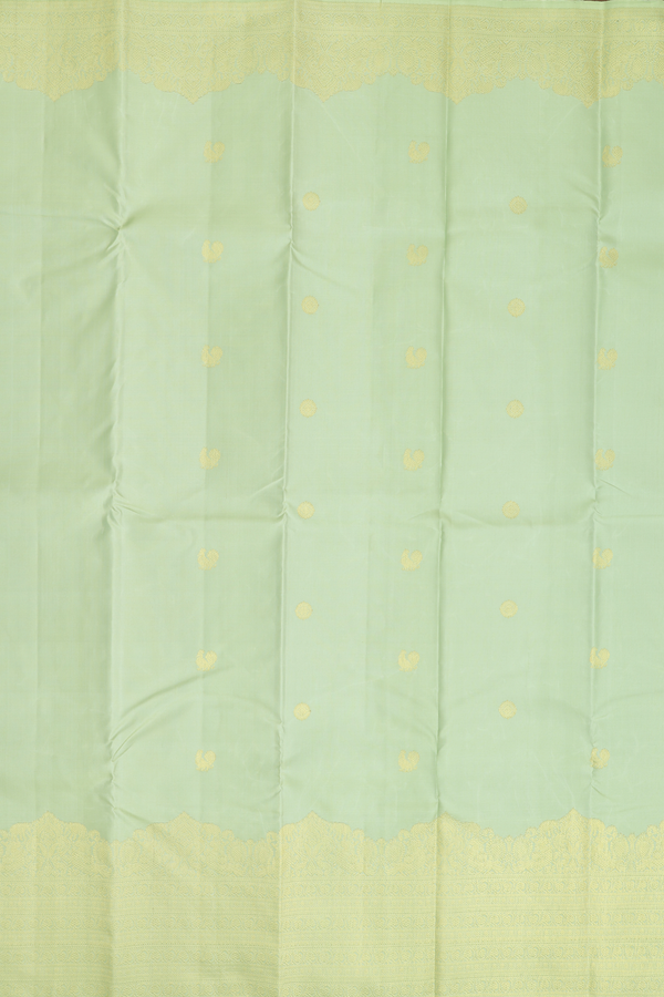 Kanchipuram Silk Saree In Pastel Green With Peacock Buttas