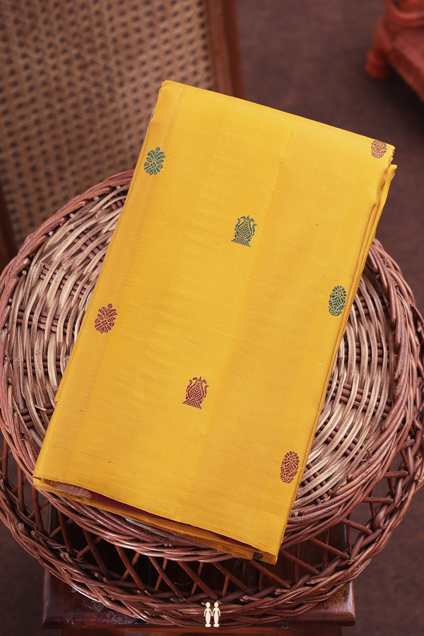 Kanchipuram Silk Saree In Saffron Yellow With Threadwork Buttas