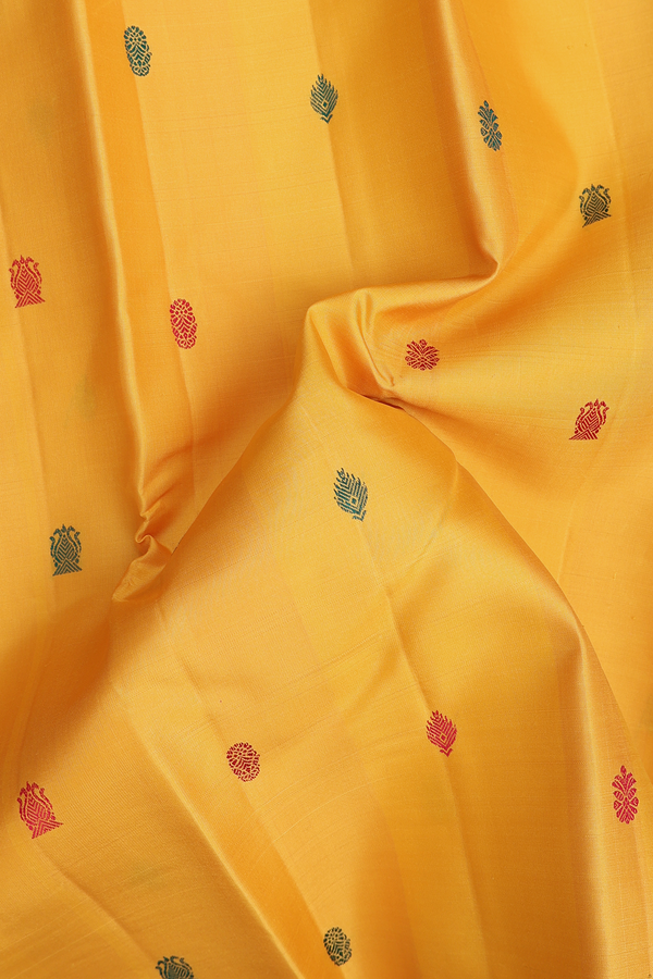 Kanchipuram Silk Saree In Saffron Yellow With Threadwork Buttas