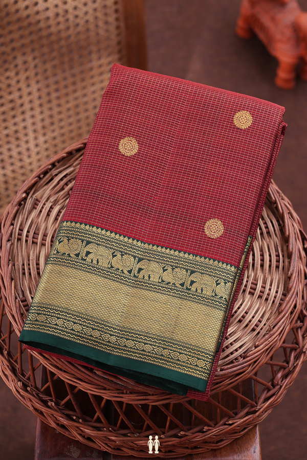 Kanchipuram Silk Saree In Maroon Along Checks With Buttas