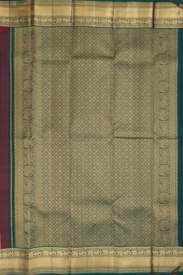 Kanchipuram Silk Saree In Maroon Along Checks With Buttas