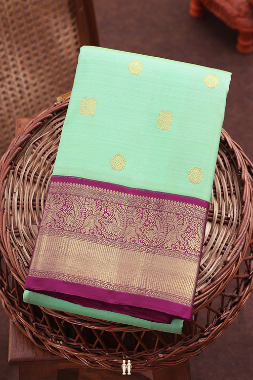 Kanchipuram Silk Saree In Green With Peacock Buttas