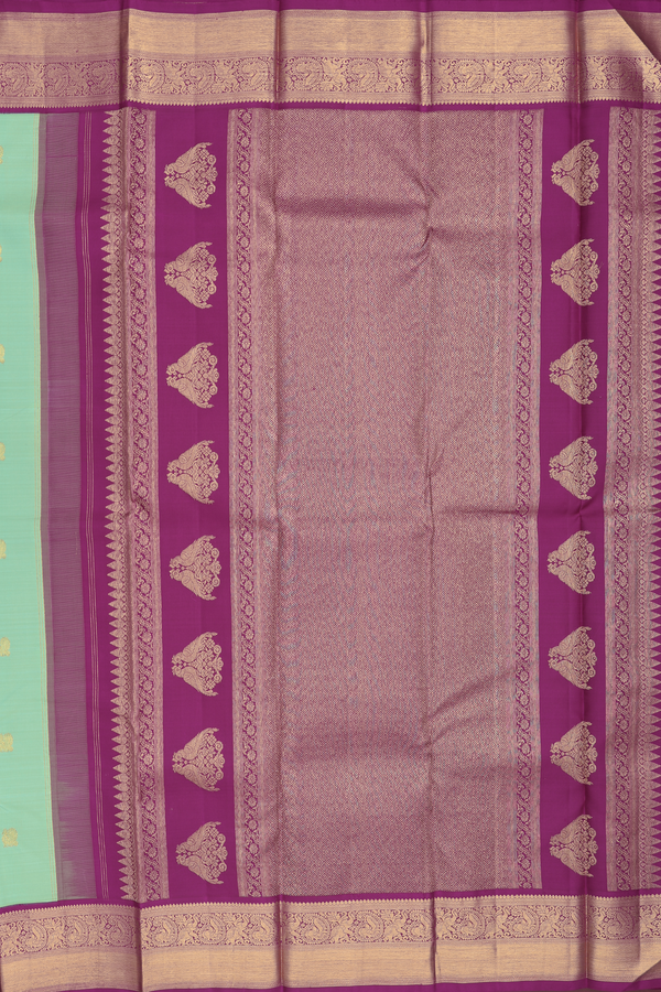 Kanchipuram Silk Saree In Green With Peacock Buttas