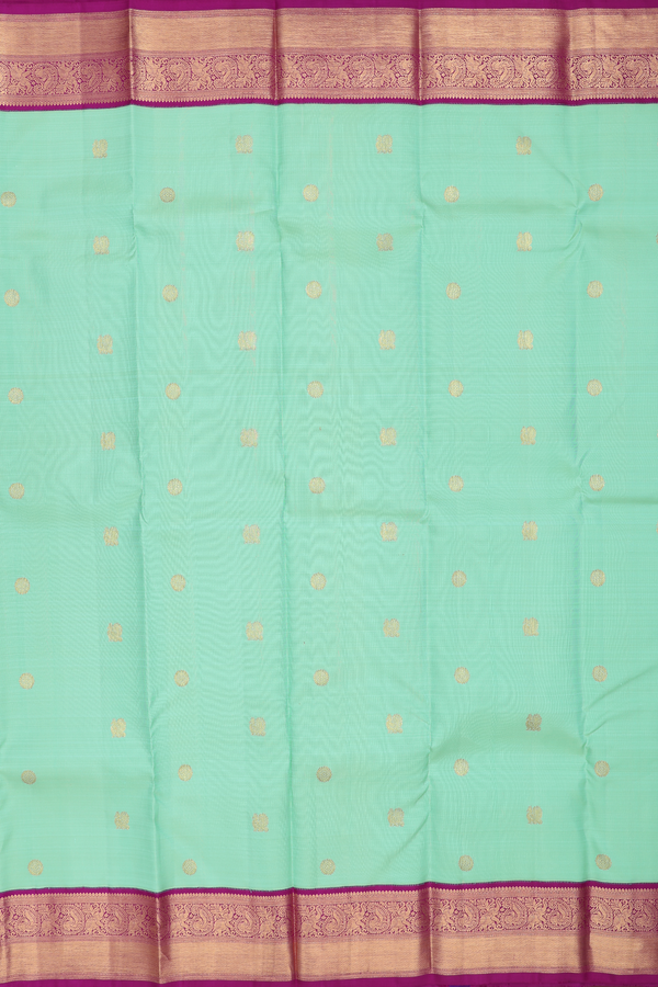 Kanchipuram Silk Saree In Green With Peacock Buttas