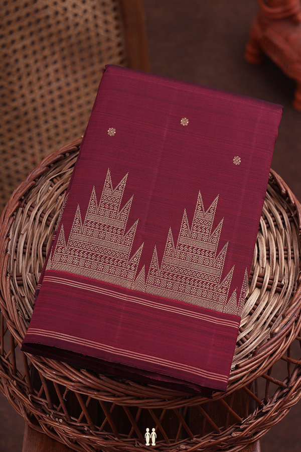 Kanchipuram Silk Saree In Maroon With Floral Buttis