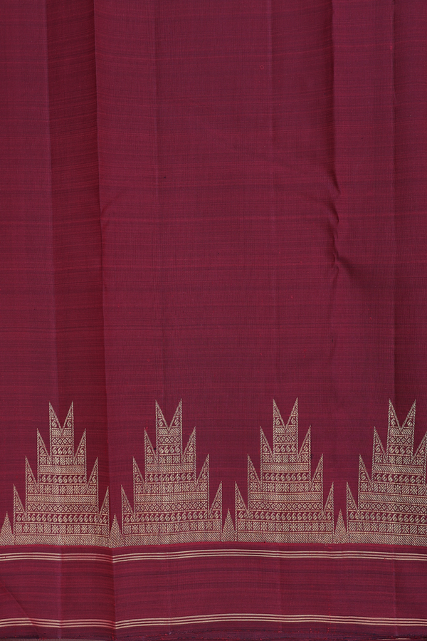 Kanchipuram Silk Saree In Maroon With Floral Buttis