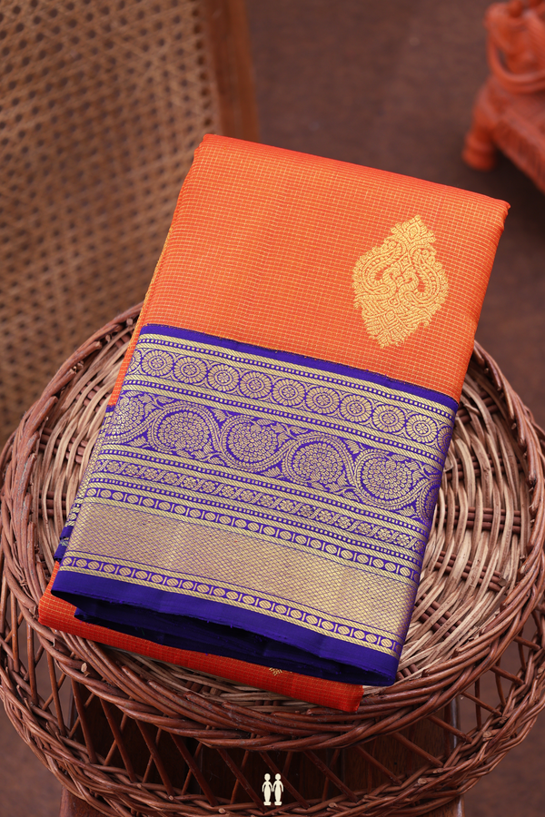 Kanchipuram Silk Saree In Orange Along Checks With Motifs