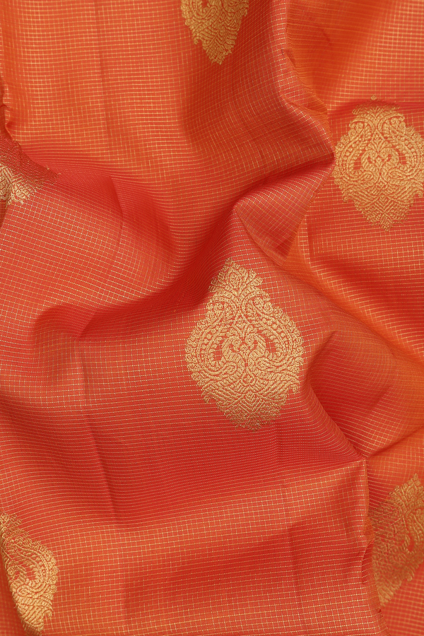 Kanchipuram Silk Saree In Orange Along Checks With Motifs