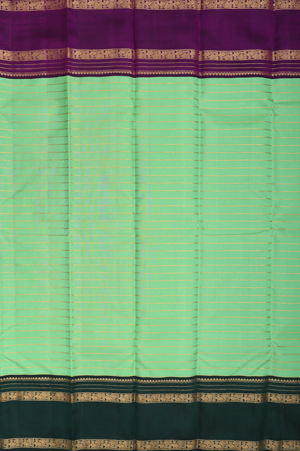 Kanchipuram Silk Saree In Light Green With Stripes Design