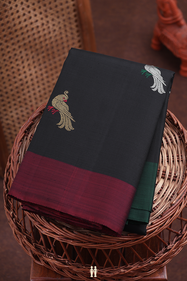 Kanchipuram Silk Saree In Black With Parrot Buttas