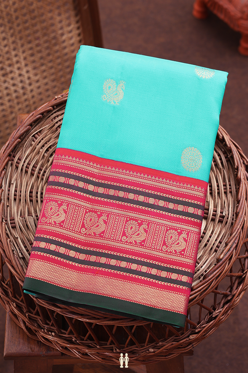 Kanchipuram Silk Saree In Aqua Blue With Peacock Buttas