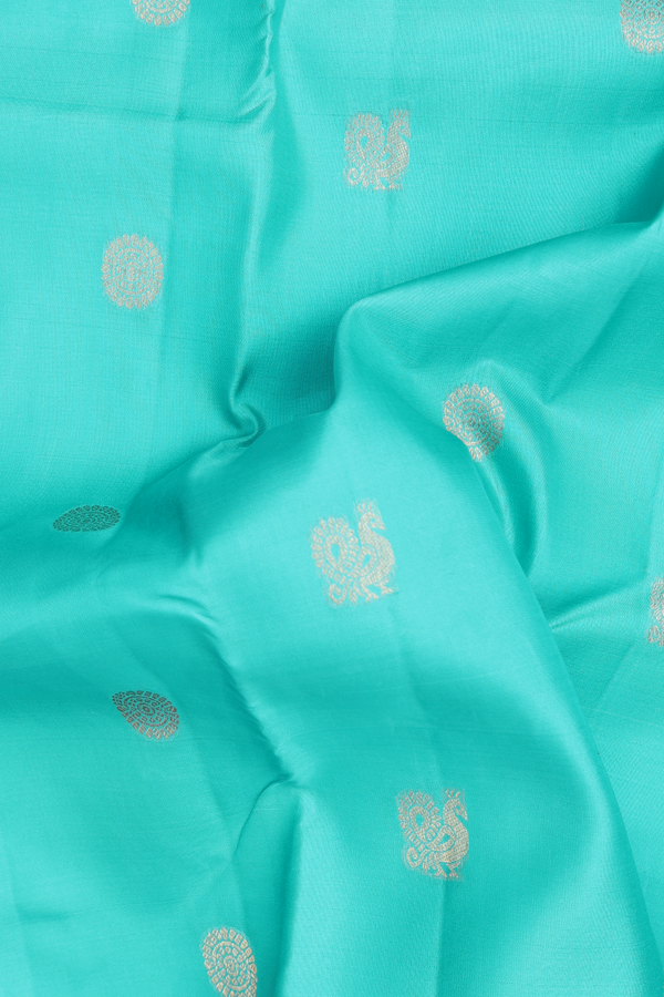 Kanchipuram Silk Saree In Aqua Blue With Peacock Buttas