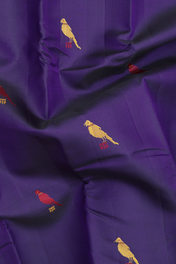 Kanchipuram Silk Saree In Deep Purple With Parrot Buttas
