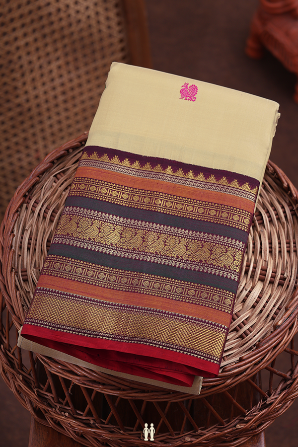 Kanchipuram Silk Saree In Light Brown With Peacock Buttas