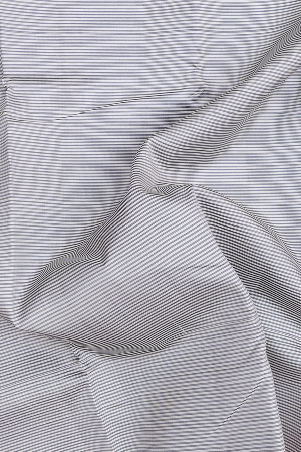 Kanchipuram Silk Saree In Cream Color With Stripes Design