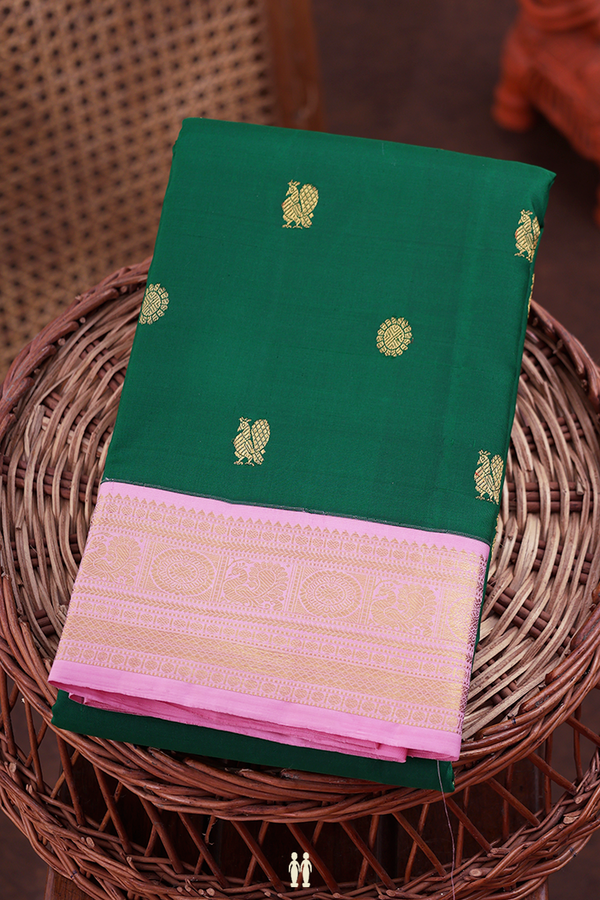 Kanchipuram Silk Saree In Green With Peacock Buttas