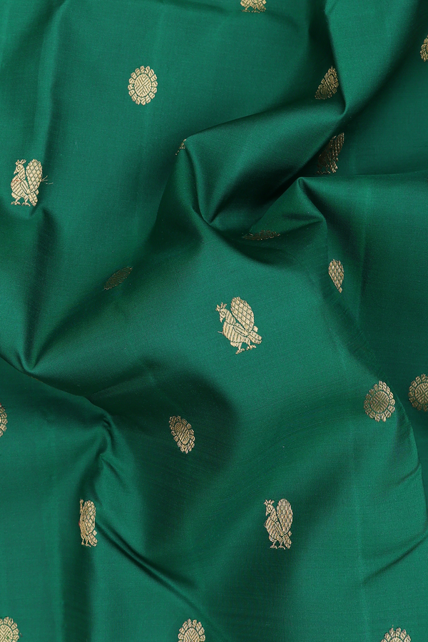 Kanchipuram Silk Saree In Green With Peacock Buttas