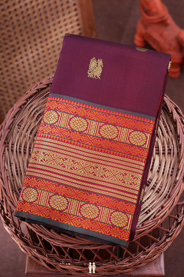 Kanchipuram Silk Saree In Maroon With Peacock Buttas