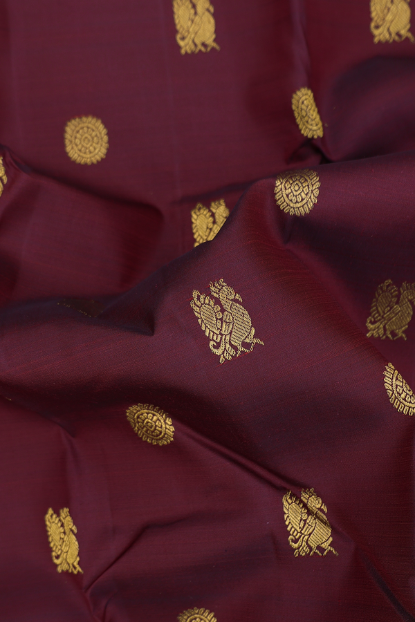 Kanchipuram Silk Saree In Maroon With Peacock Buttas