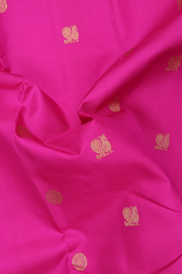 Kanchipuram Silk Saree In Magenta With Peacock Buttas