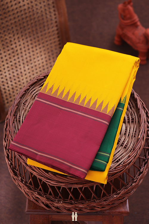 Kanchipuram Silk Saree In Yellow With Ganga Jamuna Border