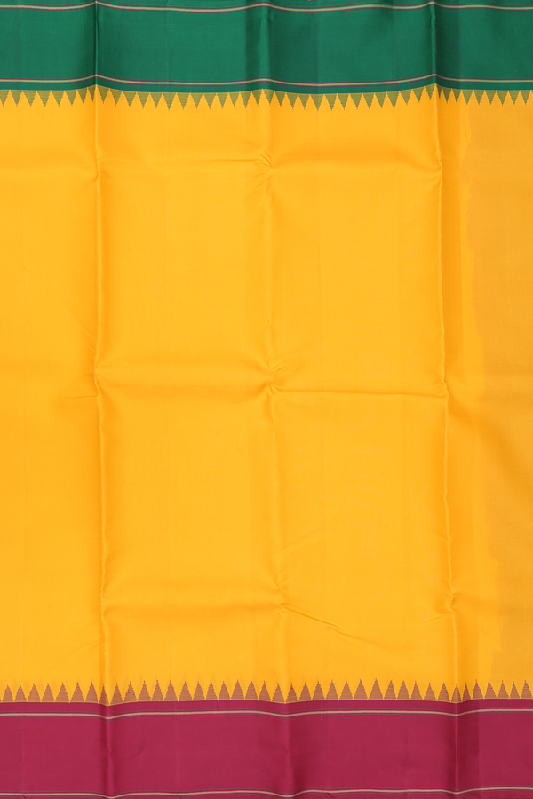 Kanchipuram Silk Saree In Yellow With Ganga Jamuna Border