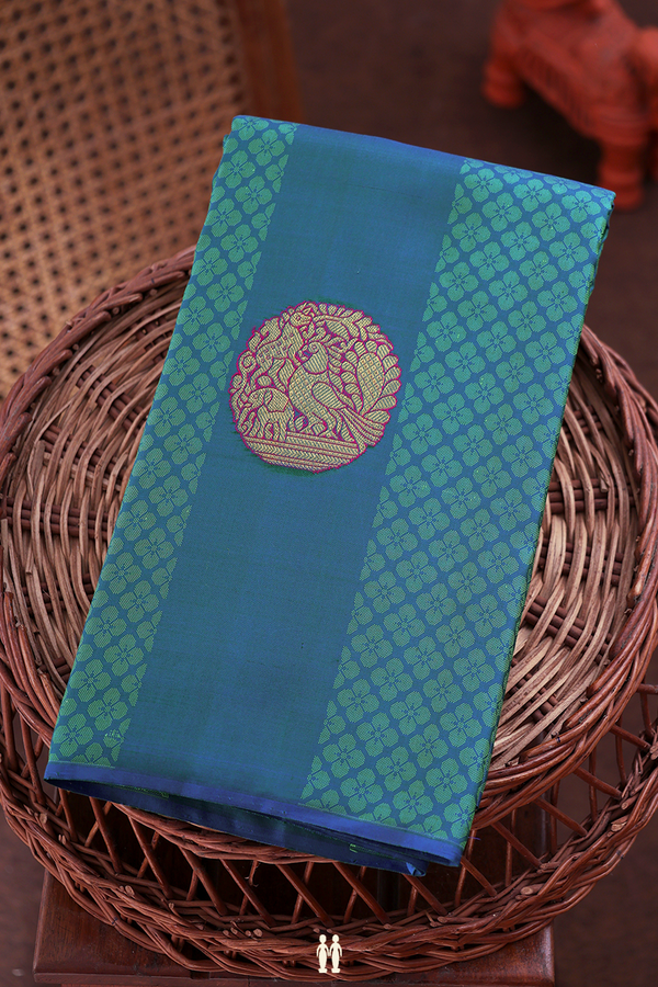 Kanchipuram Silk Saree In Teal Blue Along Stripes With Motifs