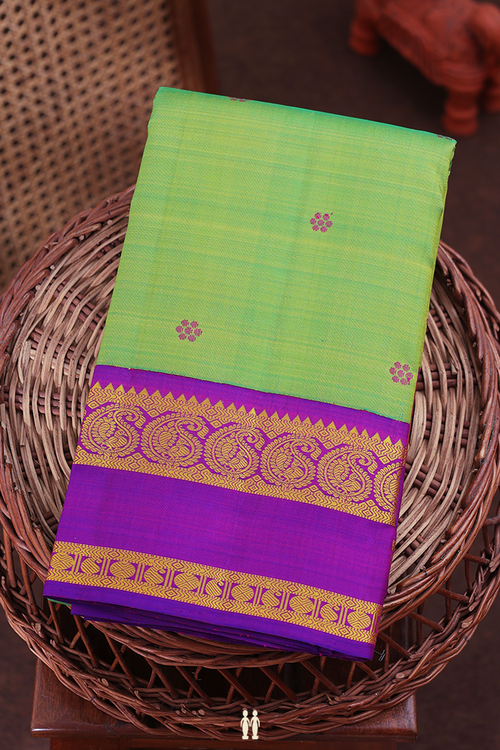 Kanchipuram Silk Saree In Parrot Green With Floral Buttas
