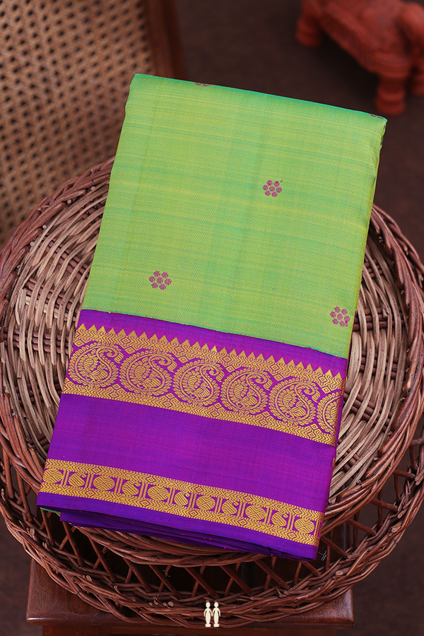 Kanchipuram Silk Saree In Parrot Green With Floral Buttas