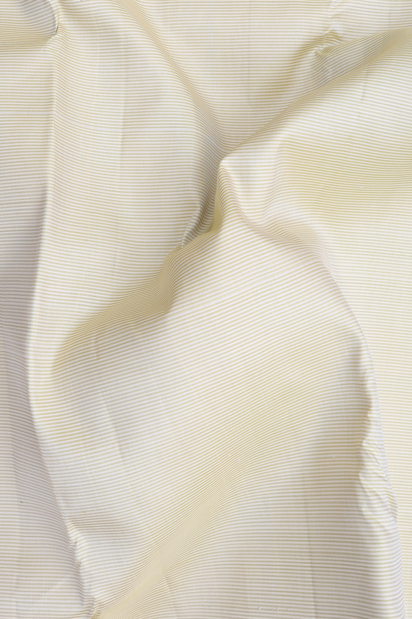 Kanchipuram Silk Saree In Cream Color With Stripes Design